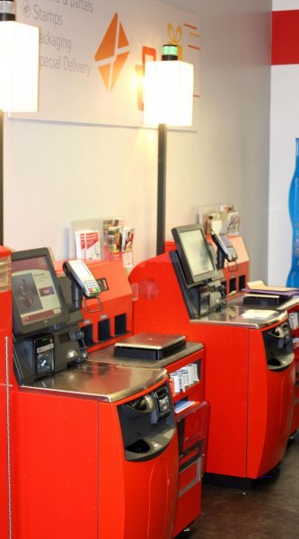 USPS self-service kiosks dispensing new Flag design